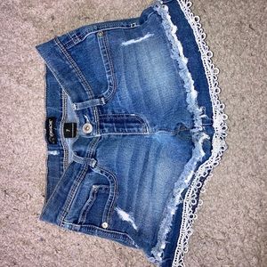 Girls Jean shorts with lace trim on bottom